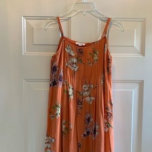 A loves a coral dress